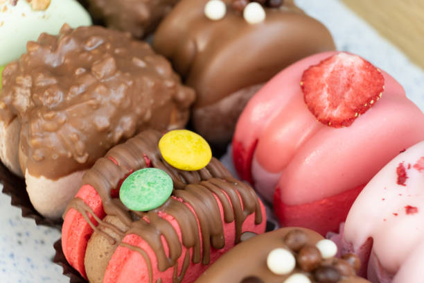 istock Colored macaroons with decoration for those with a sweet tooth close up. 1599112783