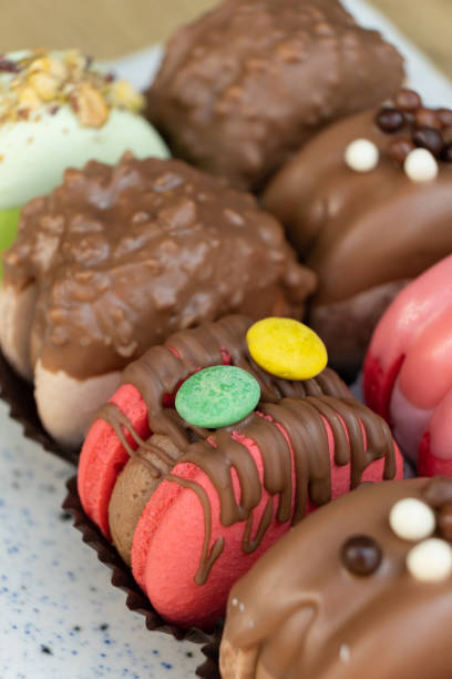 istock Colored macaroons with decoration for those with a sweet tooth close up. 1599112794