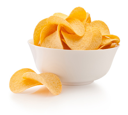 Potato chips in bowl isolated on a white background