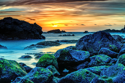 Beautiful sunset on the sea. View from Ponta da Galera. Azores, Sao Miguel. High quality photo