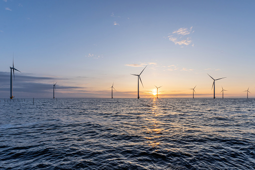 offshore wind farm at sunset