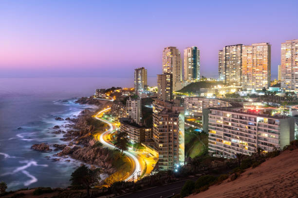 View of buildings in Concon from the sand dunes, Valparaiso Region, Chile View of buildings in Concon from the sand dunes, Valparaiso Region, Chile vina del mar chile stock pictures, royalty-free photos & images