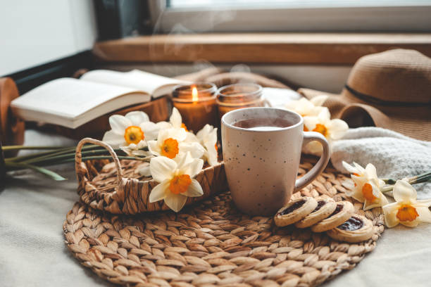istock Cup of hot tea and spring home interior. good morning concept 1599156138