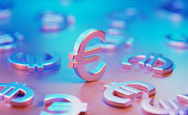 Metallic Euro Symbols Illuminated By Blue And Pink Lights On Blue And Pink Background