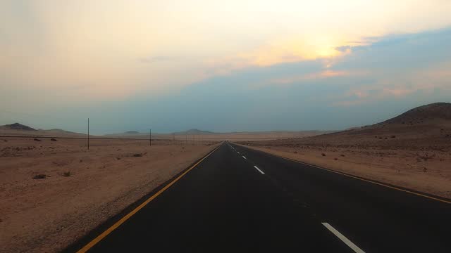 Drive to Lüderitz at sunset in Namibia, Africa