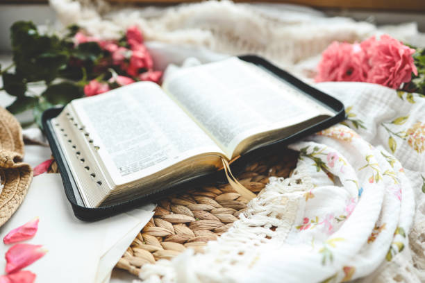 istock Open bible in home morning interior 1599254973