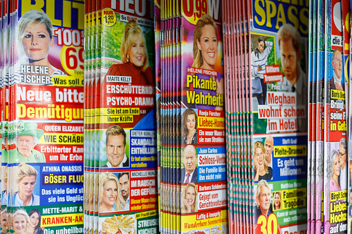 Stack of magazines isolated on white background