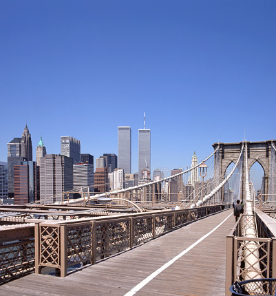 Sunny morning at the Brooklyn Bridge looking into Manhattan with the Twin Towers, NY, USA