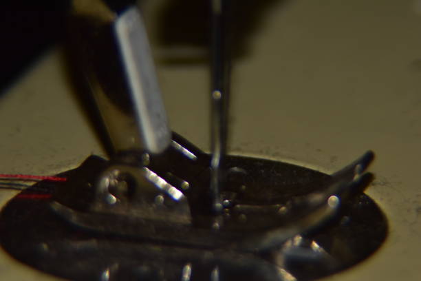 istock Close up of a sewing machine foot and needle 1599270209
