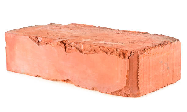 istock Old red brick isolated on a white background. Single red clay rough brick. 1599293646