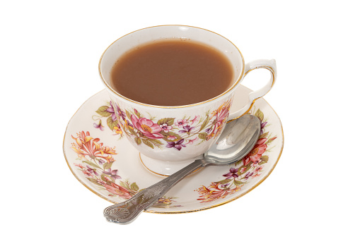 Porcelain vintage cup, saucer and candy bowl isolated on white background. Collage. Wide photo. Free space for text.