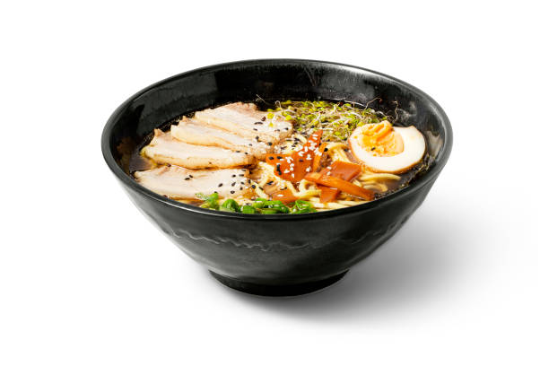istock Shoyu Ramen with pork in a bowl on white background. 1599321451