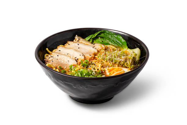 istock Shio Ramen with pork in a bowl on white background. 1599324078