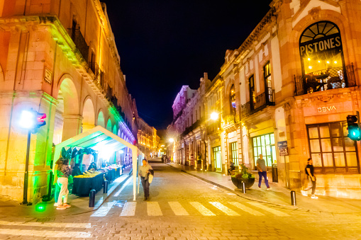Zacatecas, Zacatecas Mexico, July 25 2023 Calles iluminadas color dorado de noche, en centro histórico de Zacatecas