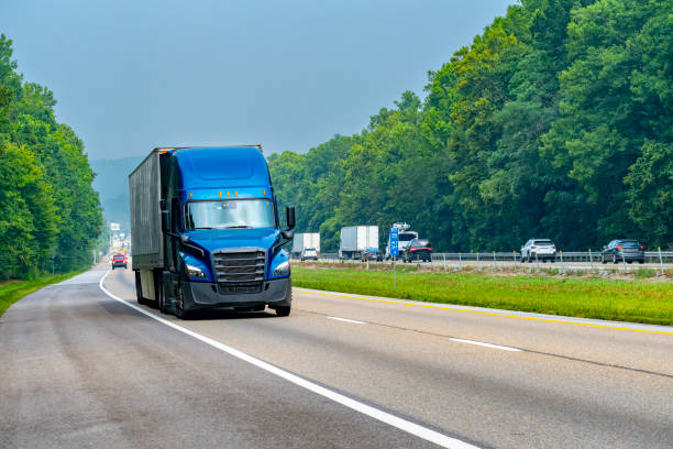 istock Tennessee Interstate Traffic Led By Blue Tractor-Trailer Rig 1599365670