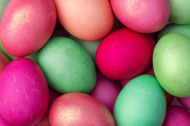 istock Multicolored painted eggs lie in a plate, Easter background, holiday 1599370133