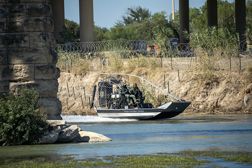 A Texas Department of Public Safety air boat patrols the Rio Grande on Saturday, August 5, 2023 near Eagle Pass, Texas.