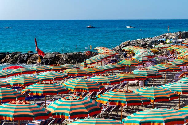 Beach umbrellas on an italian beach in Monterosso