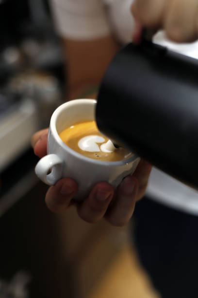 istock professional barista prepared a latte 1599469990