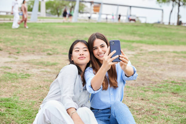 istock Friends taking a selfie in a park 1599507971