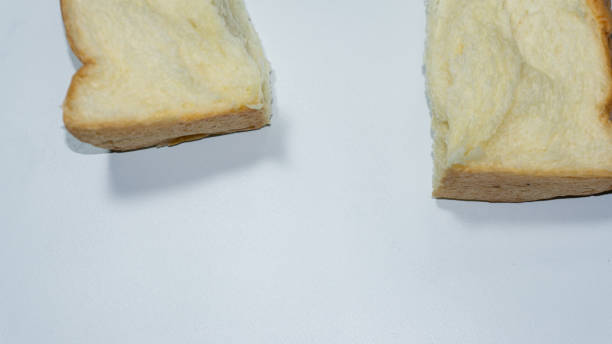 istock Sweet bread. Sweet bread that has been cut into two halves placed isolated on a white background. 1599522713