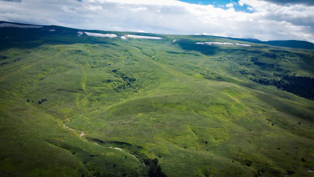 istock Mountain ranges of the Caucasus, green meadows, forests, snowfields 1599523949