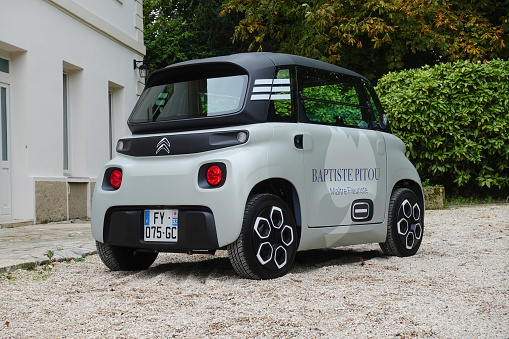 Paris, France - 22 October, 2021: Electric car Citroen Ami Cargo on a parking. This model is the smallest car in Citroen offer.