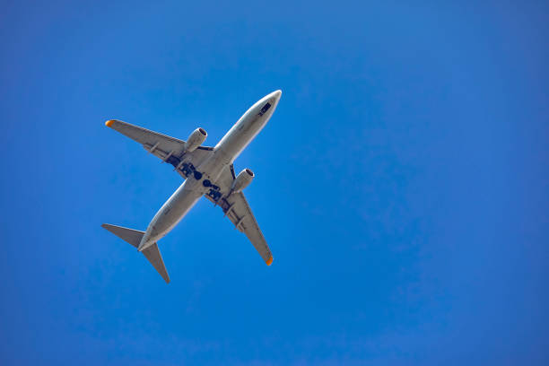 istock airliner in clear blue sky prepared for landing 1599530910