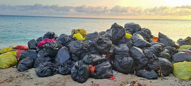 pile of plastic trash on the beach