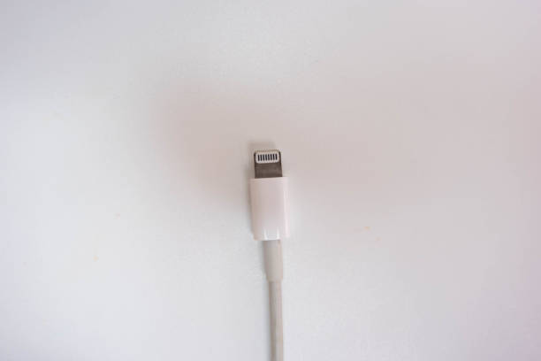 istock lightning charger with charger head for mobile phone isolated on white background 1599614586