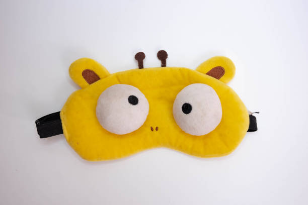 istock eye patch for sleep yellow unique design isolated on white background 1599615598