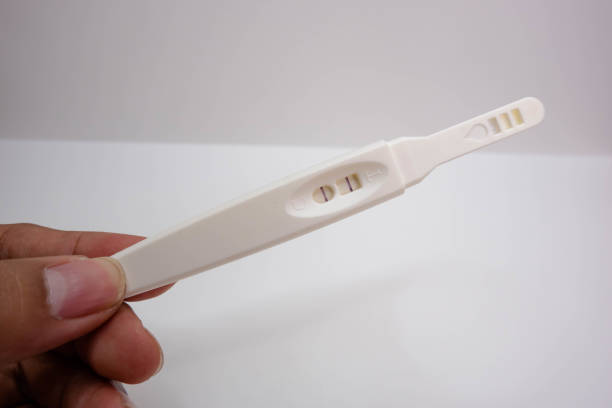 istock white and pink colored testpack with status two lines isolated on white background. used to check pregnancy in women. 1599629005