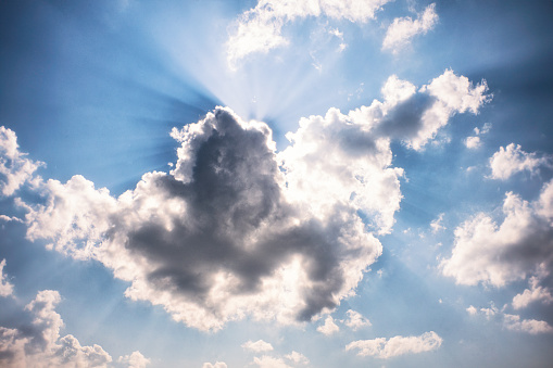 Sunrays through Clouds with a blue sky