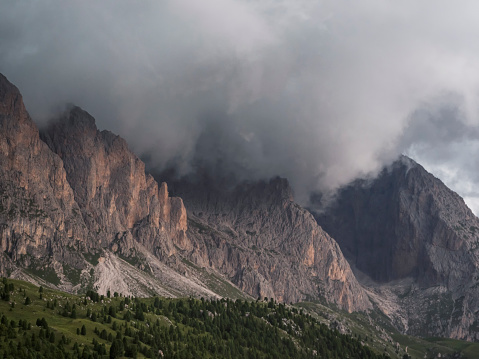 Beautiful moment caught of stormy clouds surrounding Seceda, Monte pic, Santa Christina mountains,Dolomites,Italy.