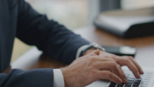 istock Financial analyst typing reports on laptop at office close up. Manager working. 1599741658