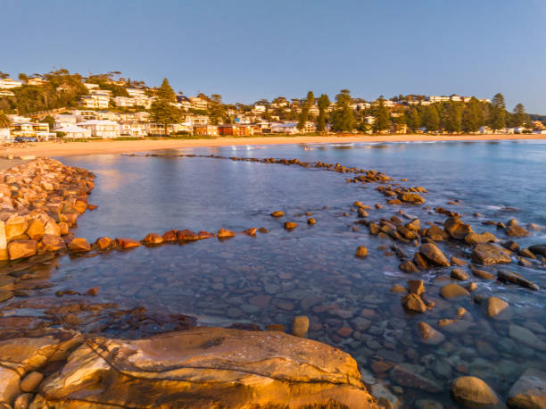 istock Winter sunrise with clear skies at the seaside 1599779879