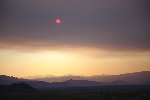 Sunset in Mojave National Preserve during a nearby fire.