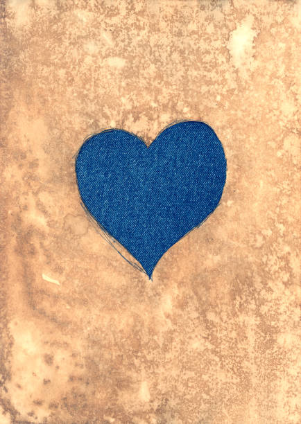 istock Jeans heart under the aged paper 1599825276