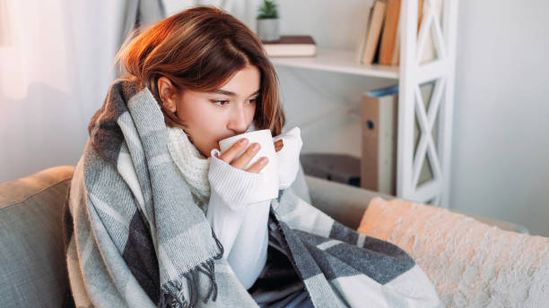 istock Tea warm rest drinking autumn shivering cold woman 1599869289
