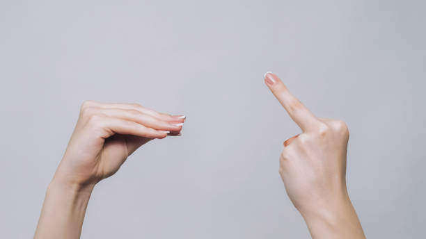 istock Blah gesture middle finger woman hands arguing 1599870398
