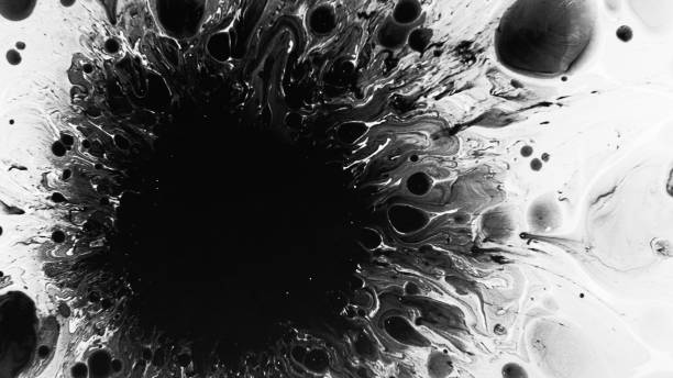 istock Black in fluid explosion dark liquid stain spread 1599870727