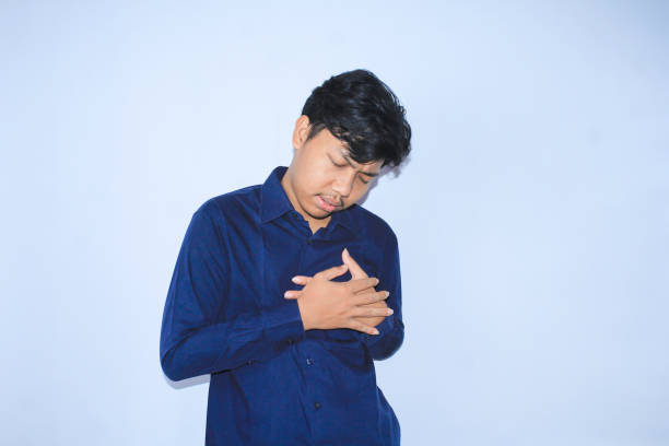 istock weak asian man office worker is unconscious and get heart attacked after working over time with close eyes 1599875856