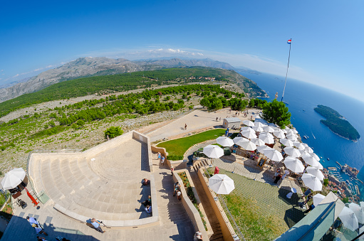 Dubrovnik, Croatia - September 22nd 2015 - Panoramic view of the Lokrum Island and mountains on the border with Bosnia & Herzegovina from the Dubrovnik Observation Point.