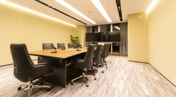 istock Empty modern company meeting room interior with multimedia equipment 1599982742
