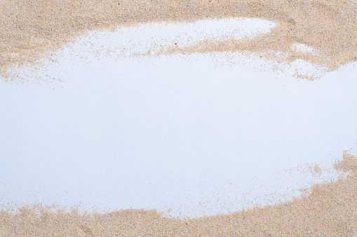 Sand on white background.
