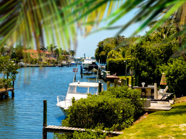 istock Docked boats on canal in Florida 1600121801