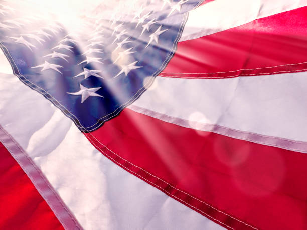 istock Close up shiny American flag with sunbeam 1600121946