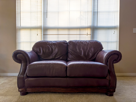 Single leather sofa and interior of house