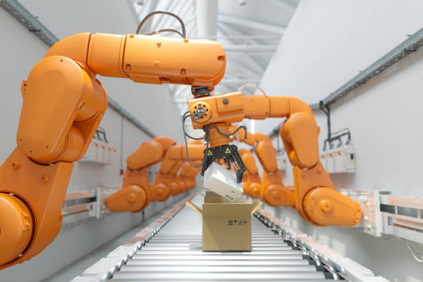 istock Robot Arms Packing Cardboard Boxes On Conveyor Belt 1600145784
