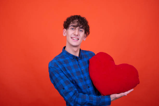 istock Valentine's day and cheerful guy. 1600157233